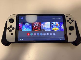 Nintendo Switch OLED with dock and 1TB sd card ! 220