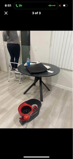 Round Black Marble-Top Dining Table