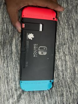 Nintendo Switch original with both controllers (comes with charger)