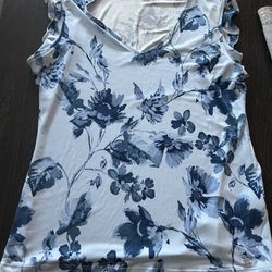Blue floral top with ruffle sleeves size medium by Calvin Klein 