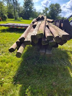 Approximately 21 heavy duty landscaping timbers