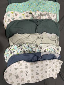 Nine baby swaddles