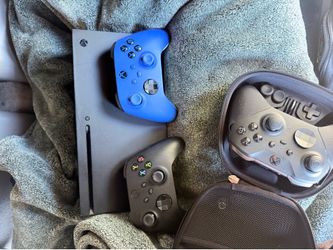 Xbox series x with controllers