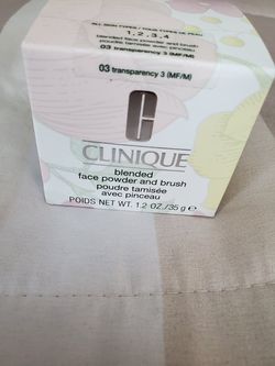 Clinique face powder and brush