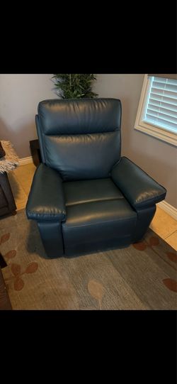 Blue leather recliner chair