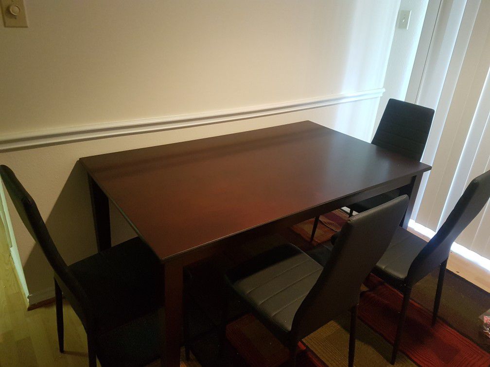 6 seater dining table with 4 faux leather chairs, less than month old for sale in McLean, VA