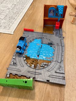 Portable Thomas train box , Thomas train set one Motorized Thomas train, one RAVENSBURGER Lifting Bridge , Brio train set
