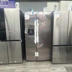 GE - Side By Side Refrigerator With Water And Ice Dispenser In Stainless Steel 