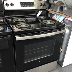 New Scratch And Dent GE Coil Top Stainless Steel Range. 1 year Warranty 