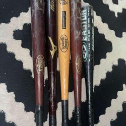 5 baseball bats, 4 wooden and 1 aluminum, in good condition, I am not selling them separately.