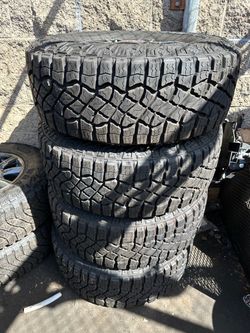 18” 6 Lug Gmc OEM Rims with LT275/70R18 Goodyear tires