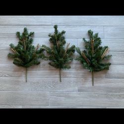 Artificial Evergreen Swag With  A Light Gold Accent With Wood Branches