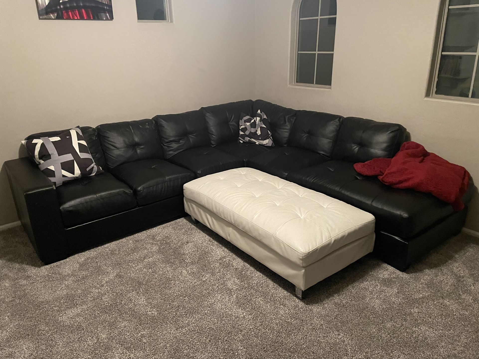Black Leather  Sectional And Ottoman