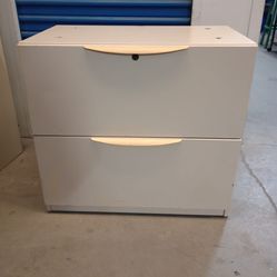 Solid metal file cabinet with key