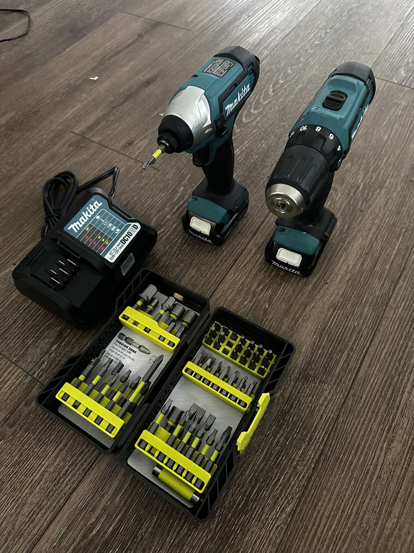 Makita Drill And Impact Driver With Charger, 2 Batteries, And Drill Bit Set