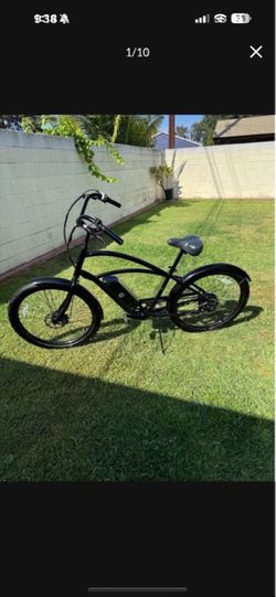 Tuesday men’s August live.. electric black bike.. like new..$350