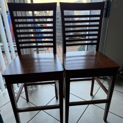 Two High Chairs In Brown 