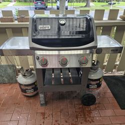 Weber Gas Grill with 2 propane tanks