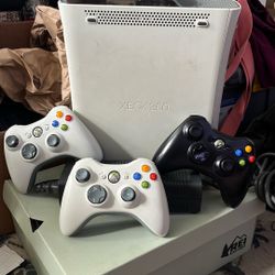 XBOX 360 And 3 Controllers 