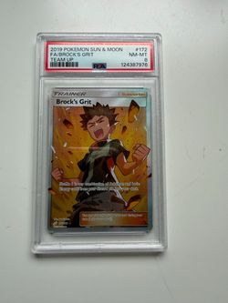 Pokémon Brock's Grit Full Art PSA 8 NM-MT