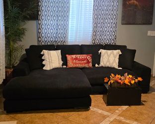 Black Sectional Sofa L style with wide and comfortable chaise Revirsible to any side ... like new conditions clean .. no pets no smoking I'm Moving Ca