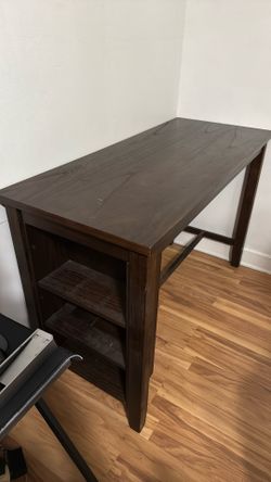 Dinner table with its chairs