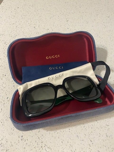 Women's Gucci sunglasses.