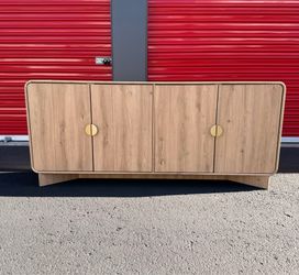 Brand new credenza with gold accent handles
