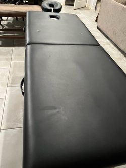 Massage table