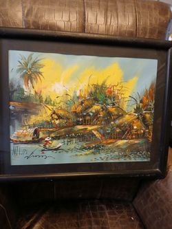 Framed east Asian riverside village