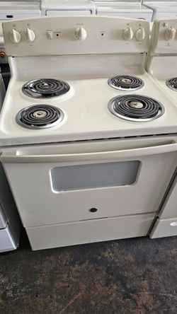 GE STOVE .BEIGE COLOR.
