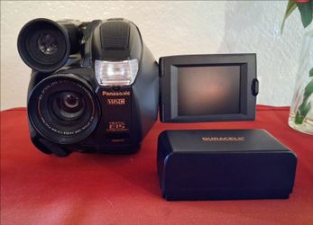 Panasonic Palmcorder PV-L559 VHS-C camcorder featuring a 150x digital and 26x zoom lens.