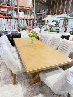 Pennfield dining set 9 piece with grey fabric chairs from Costco