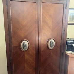 Gorgeous wood Armoire Hemingway style