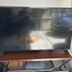 65 Inc And 55 Inch Tv  And Table  