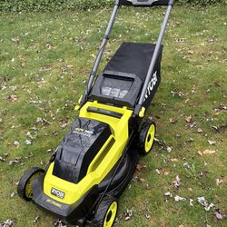 Like new Ryobi 40V electric lawn mower and weed wacker