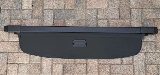 Volkswagen Tiguan OEM 2018-2024 Cargo Cover Rear Trunk Privacy Shade by Macauto is a black,