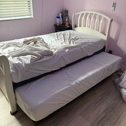 Twin bed with pop up Trundle