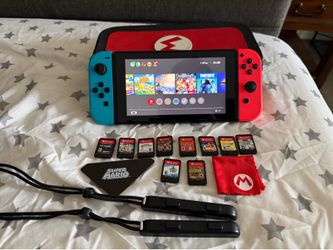 Nintendo Switch + 10 Games + Case + Docking Station