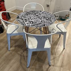 Modern Table + Vintage Stackable Metal Chairs