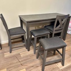 Caitbrook Counter Height Dining Table and 4 Barstools 