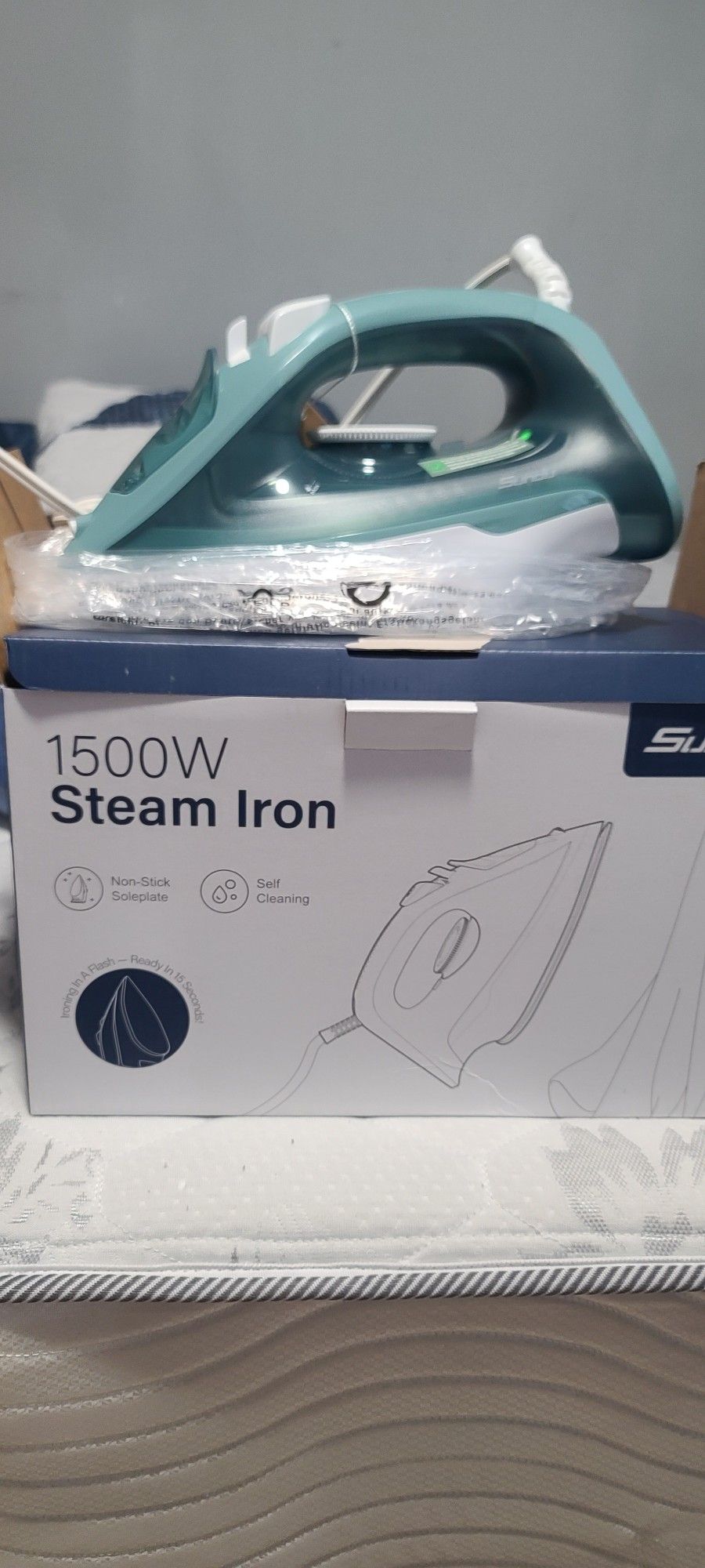 Sundu brand steam iron