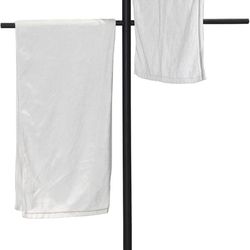Swimming pool towel rack