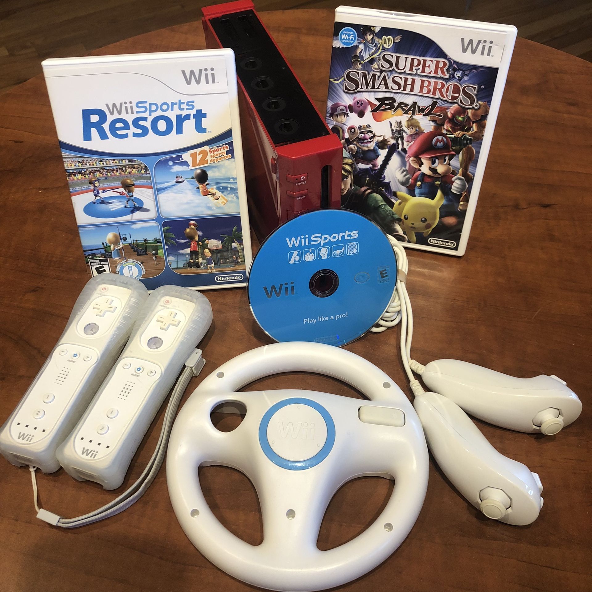 Red Wii Bundle + Wii Sports. Sports Resort, & Smash Bros!