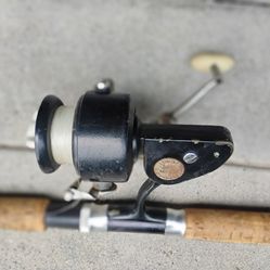 Very rare vintage penn spinfisher reel with textured black finish w Roddy custom 2 piece pole