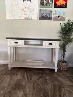 White table with black top couch table