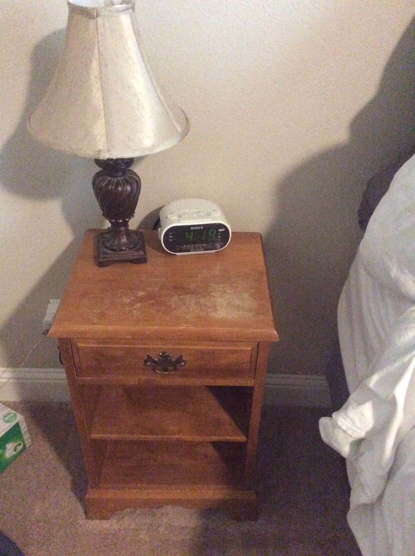 nightstands, lamps, and alarm clocks