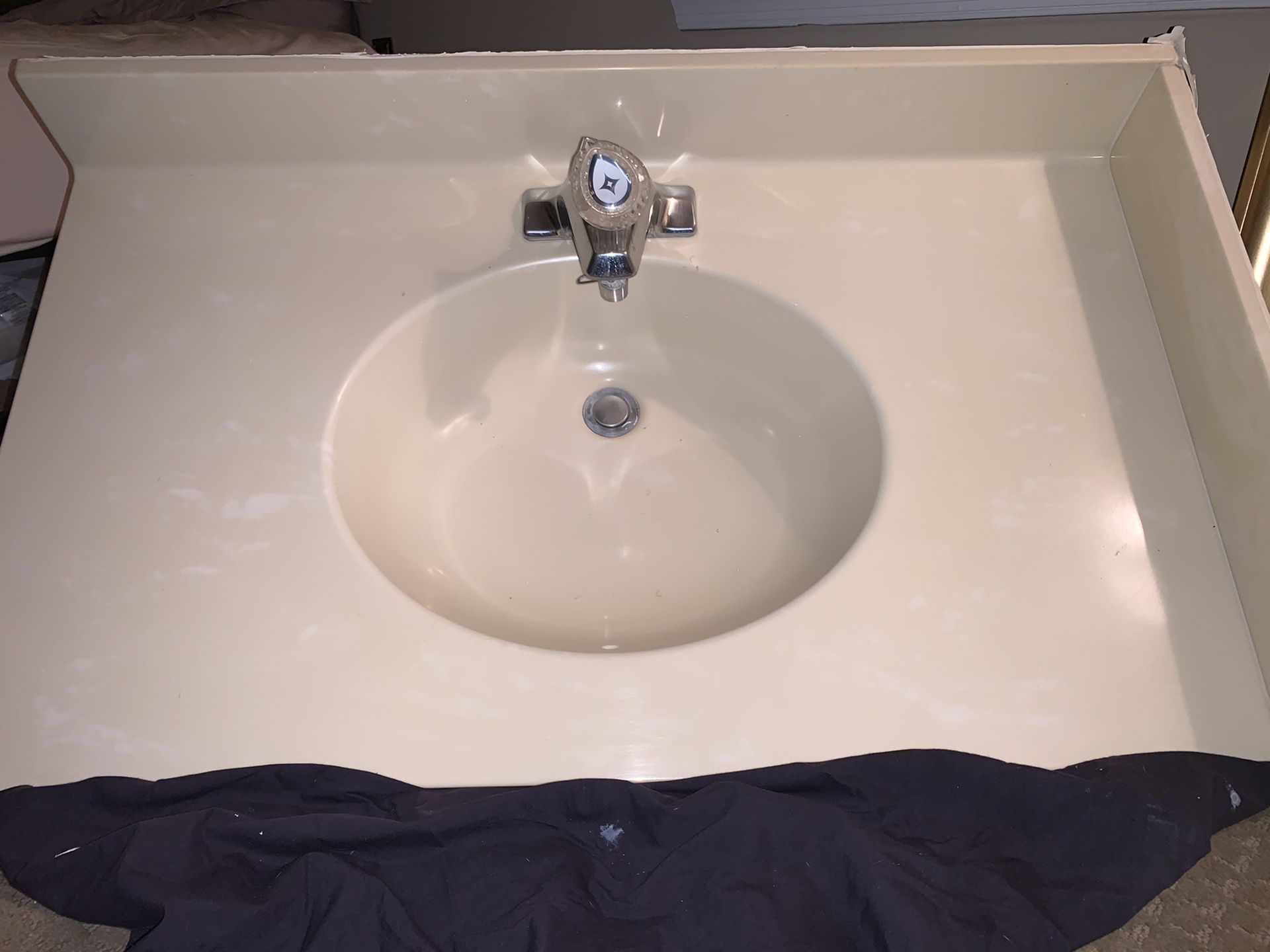 Bathroom vanity top and faucet
