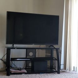 Tcl SmartTV And TV Stand