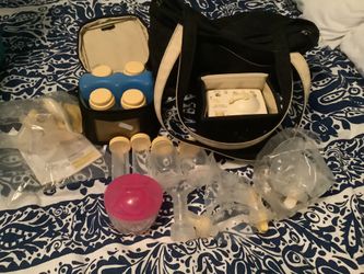 Medela Brest Pump and Bag& Bottles & Hand Pump All